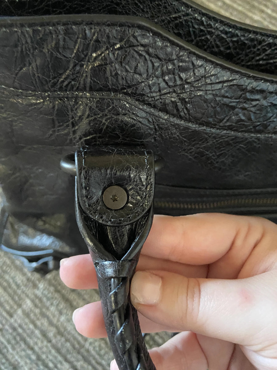 Balenciaga hardware engraving and stitching detail